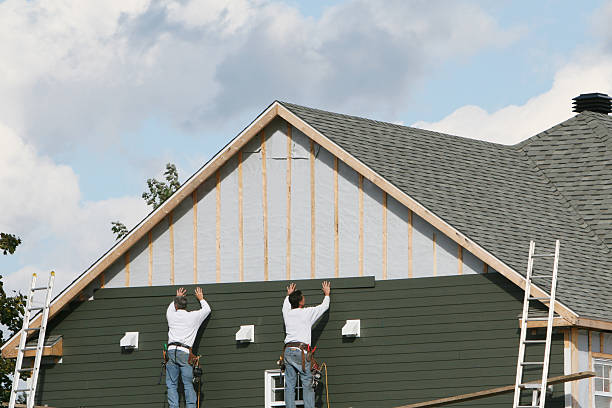 Professional Siding Replacement technician working in Auburn, IN